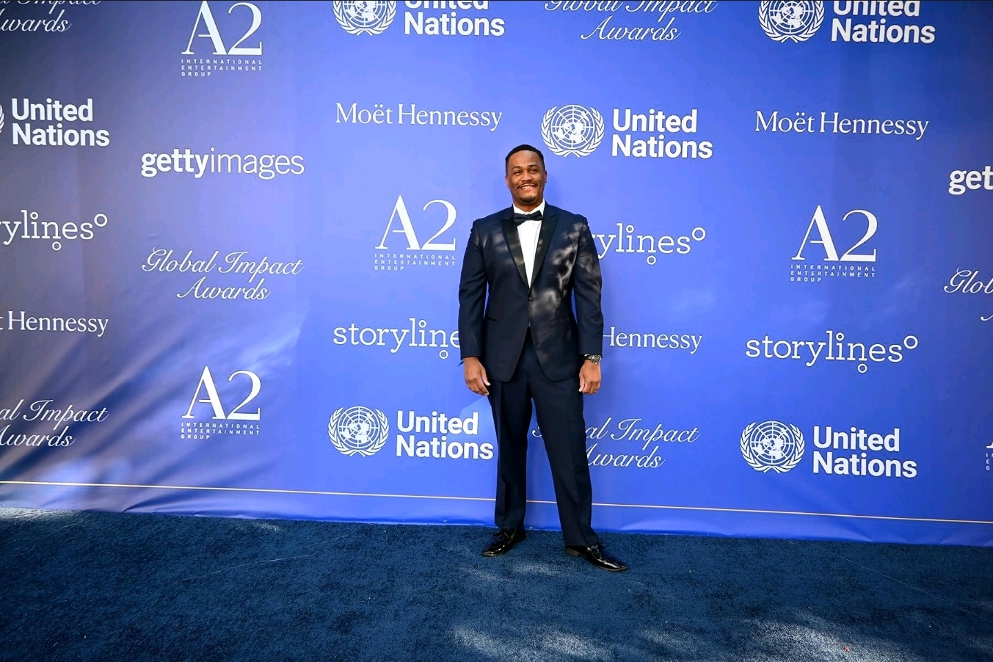E'Ian West on the red carpet at the United Nations Global Impact Awards