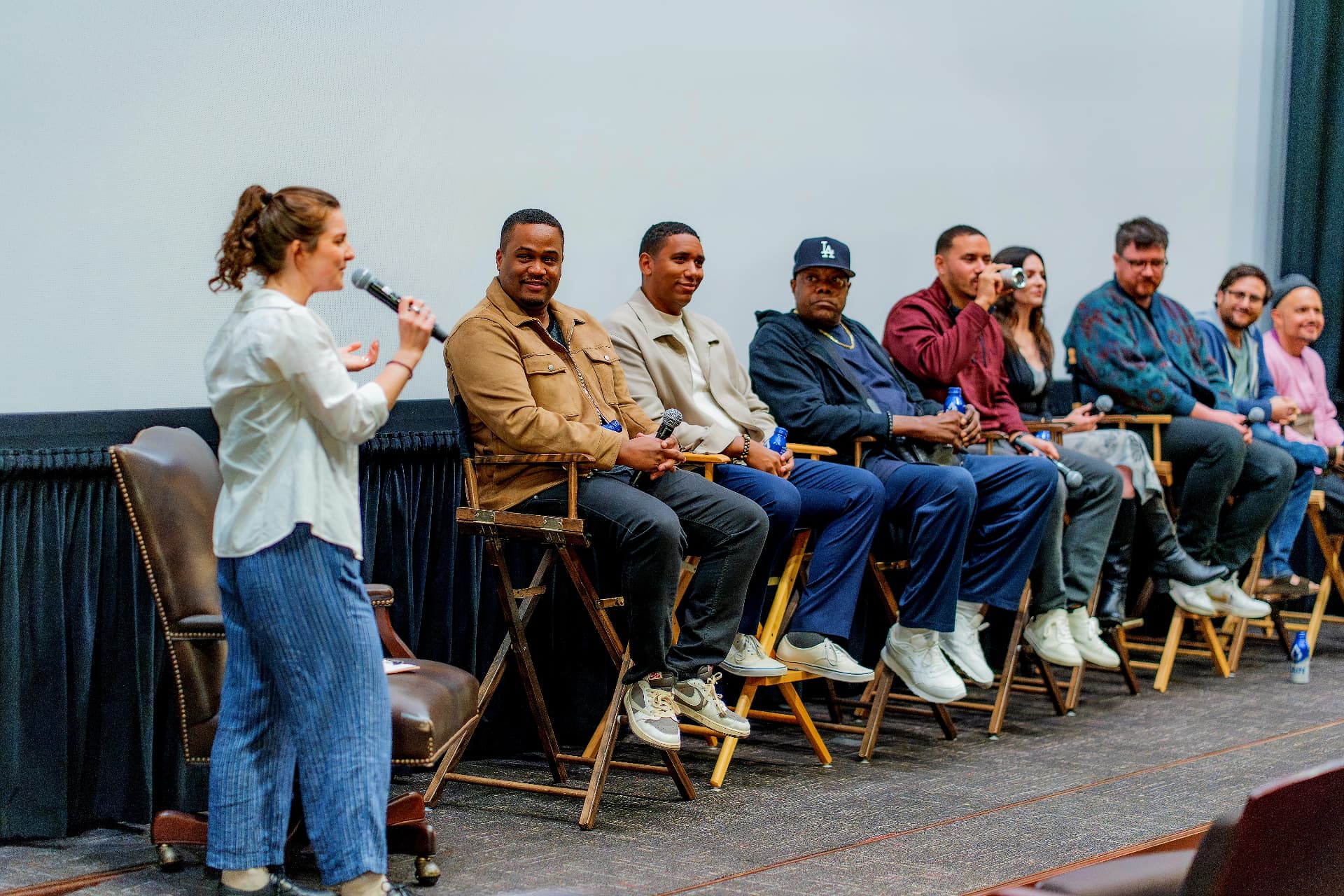 E'Ian West on stage with fellow filmmakers during a post screening panel Q and A E'Ian West on stage with fellow filmmakers during a post screening panel Q and A