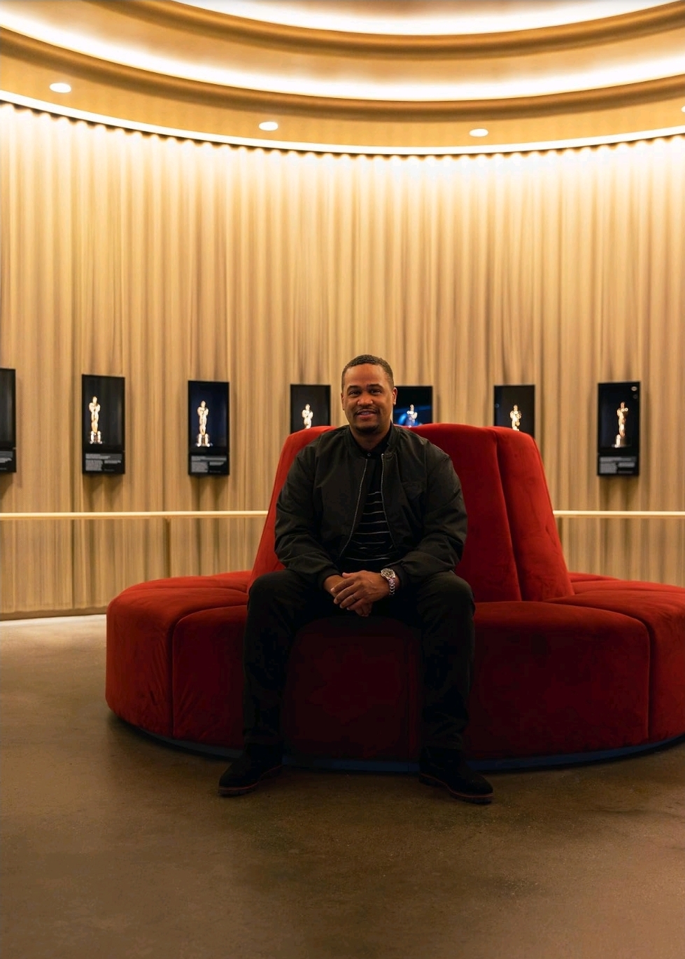 E'Ian West seated inside the Academy Museum Oscars lounge E'Ian West seated inside the Academy Museum Oscars lounge