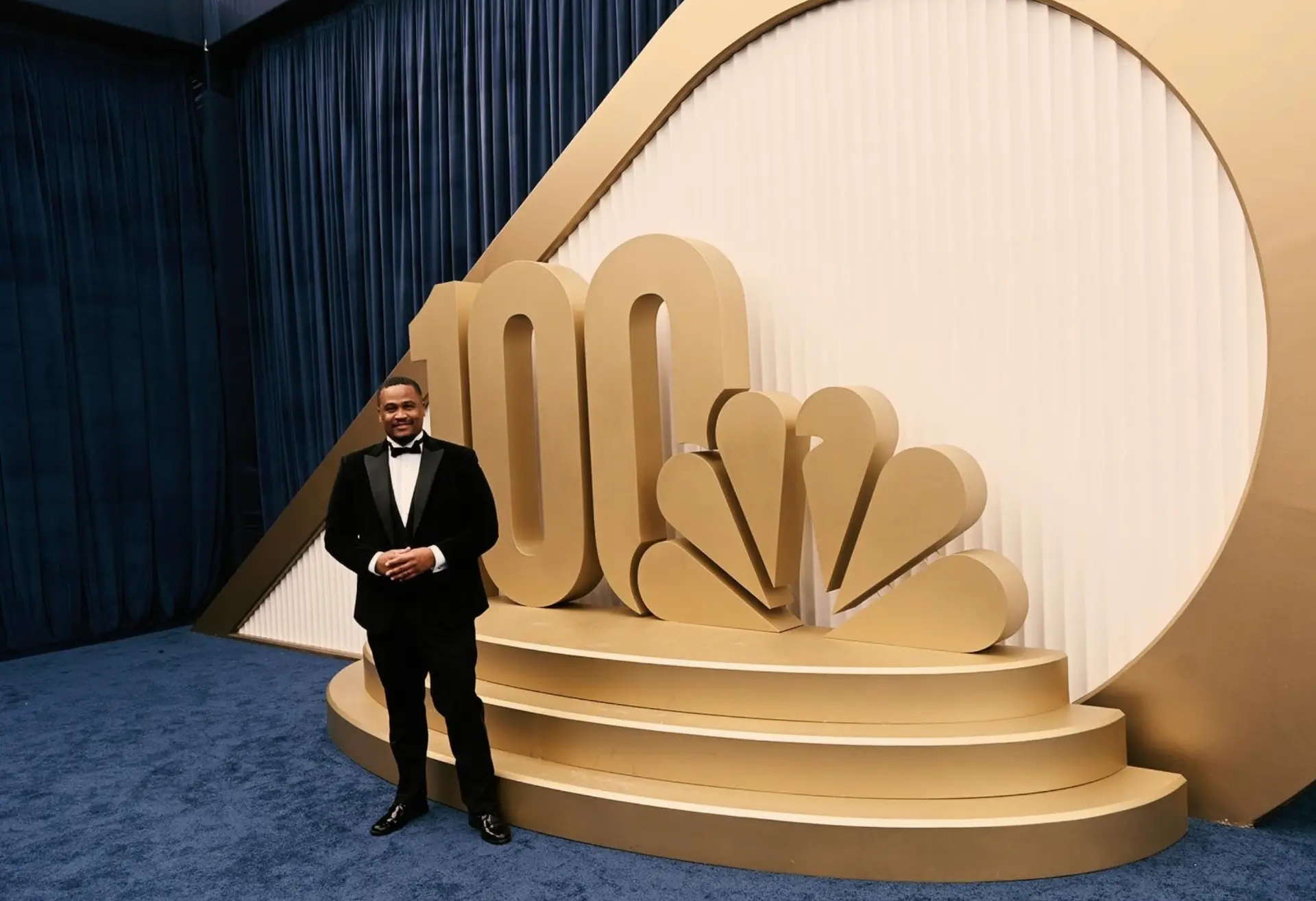 E'Ian West at the Emmys beside the NBC 100 Years installation E'Ian West at the Emmys beside the NBC 100 Years installation