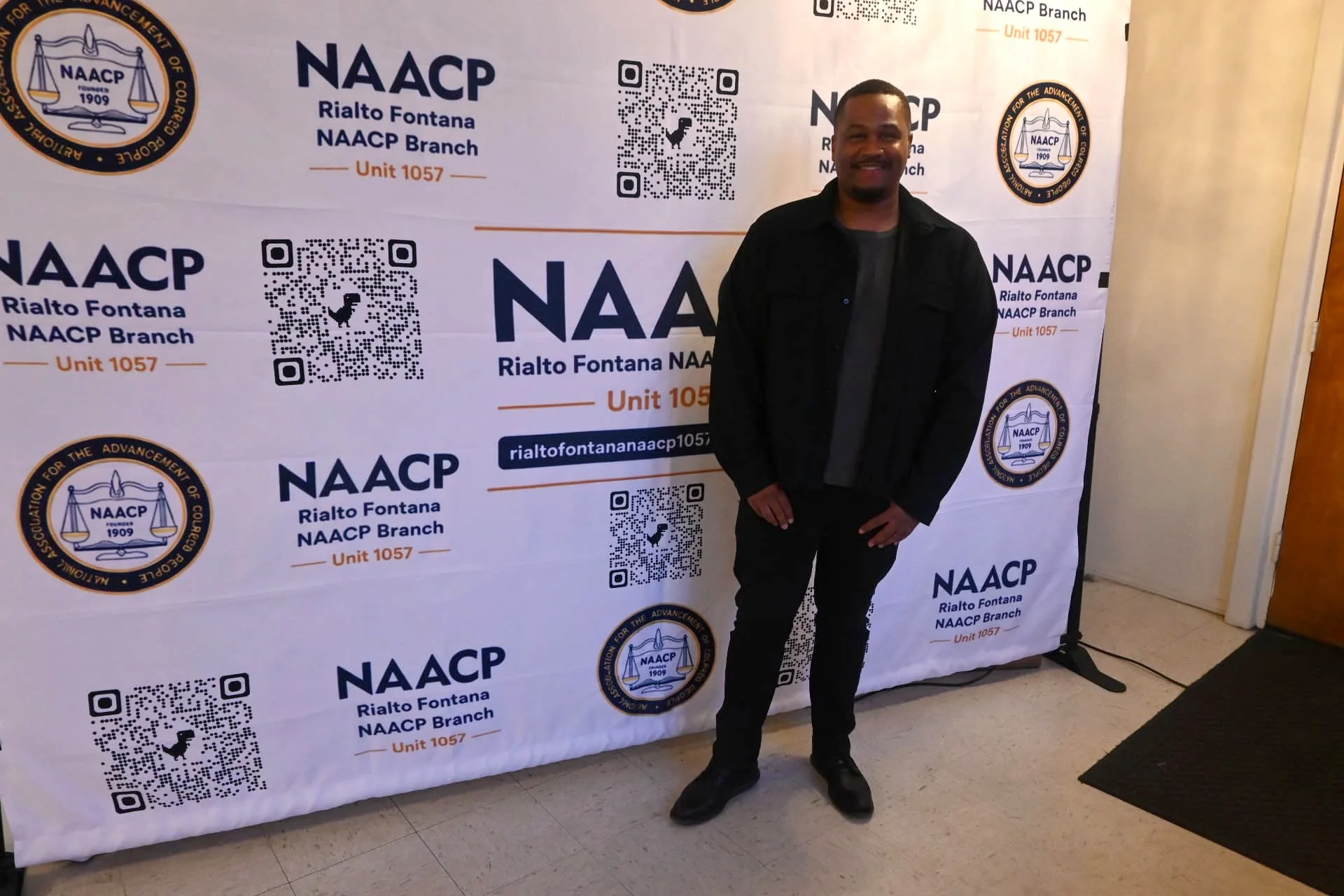 E'Ian West in front of the NAACP backdrop at the Rialto Fontana Branch event E'Ian West in front of the NAACP backdrop at the Rialto Fontana Branch event