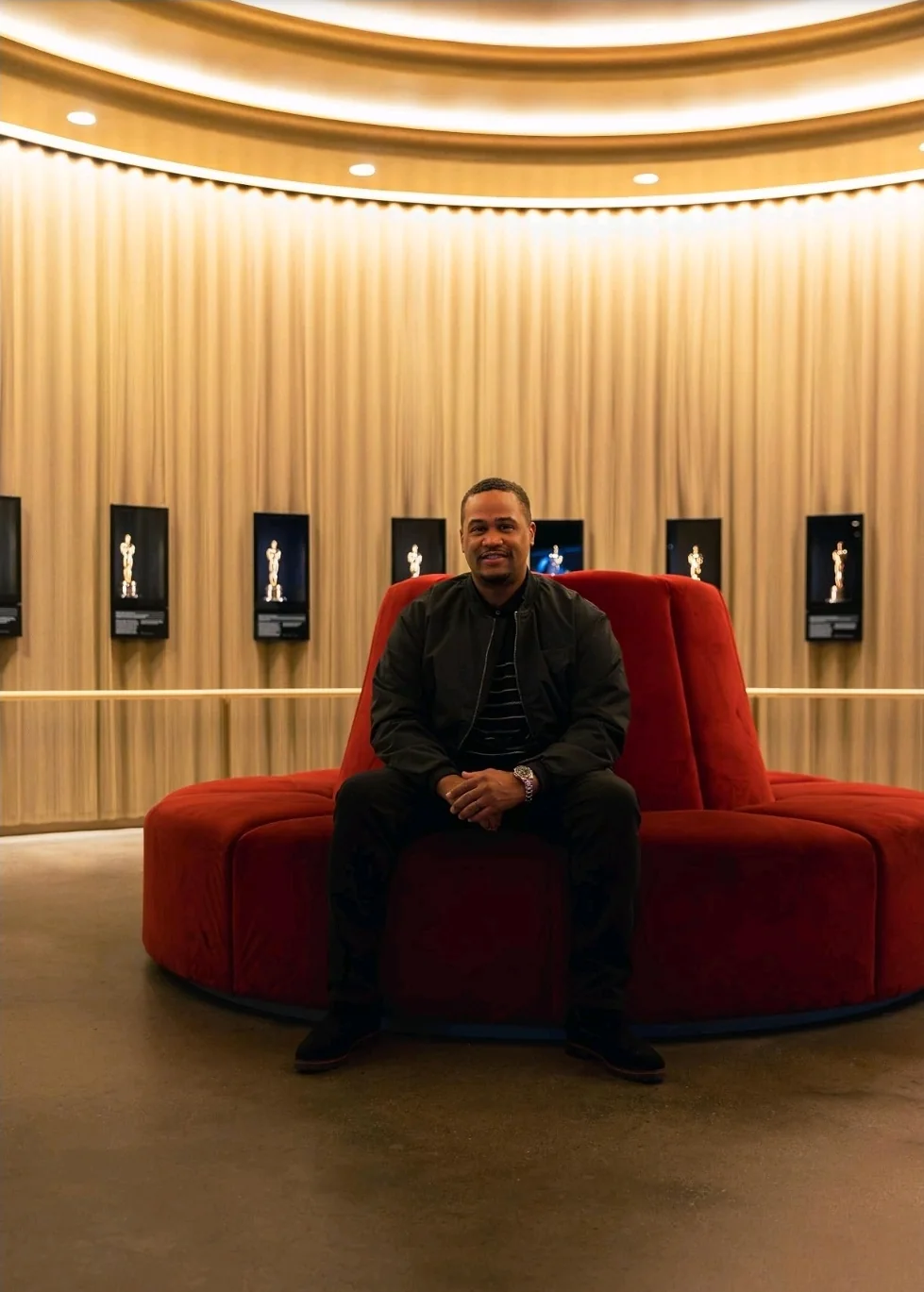 E'Ian West seated inside the Academy Museum Oscars lounge E'Ian West seated inside the Academy Museum Oscars lounge